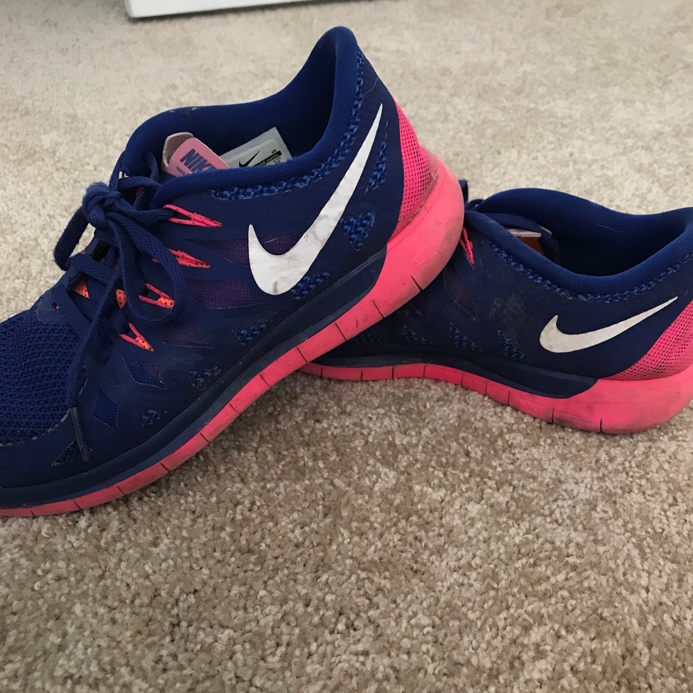 Blue and pink nike shoes
